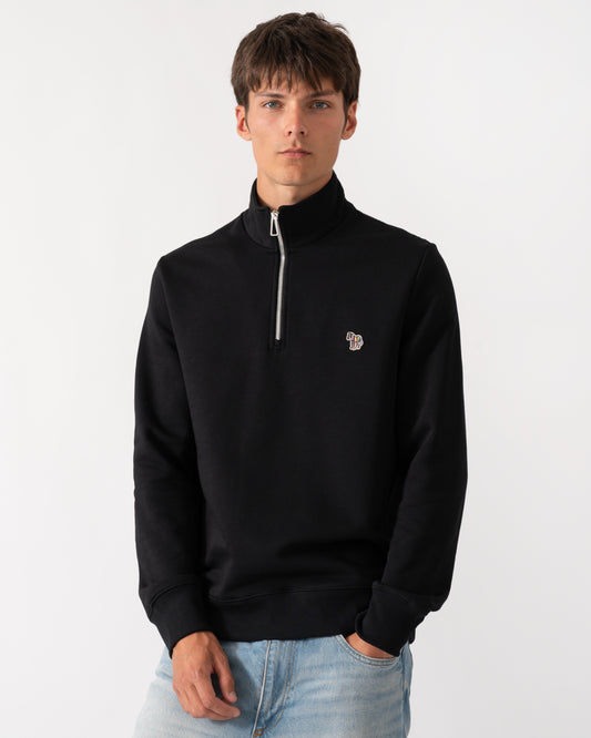 a model wearing a PS Paul Smith Mens Regular Fit Zebra Logo 1/4 Zip Top in 79 Black