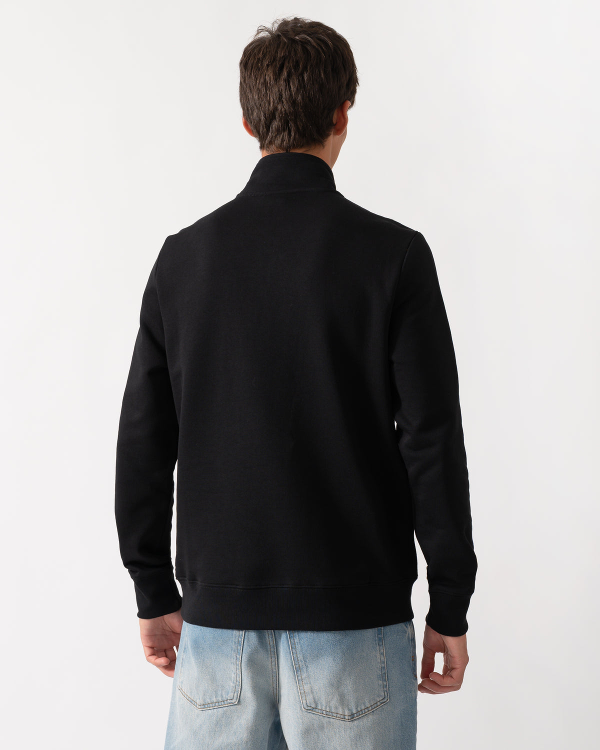 back of a model wearing a PS Paul Smith Mens Regular Fit Zebra Logo 1/4 Zip Top in 79 Black