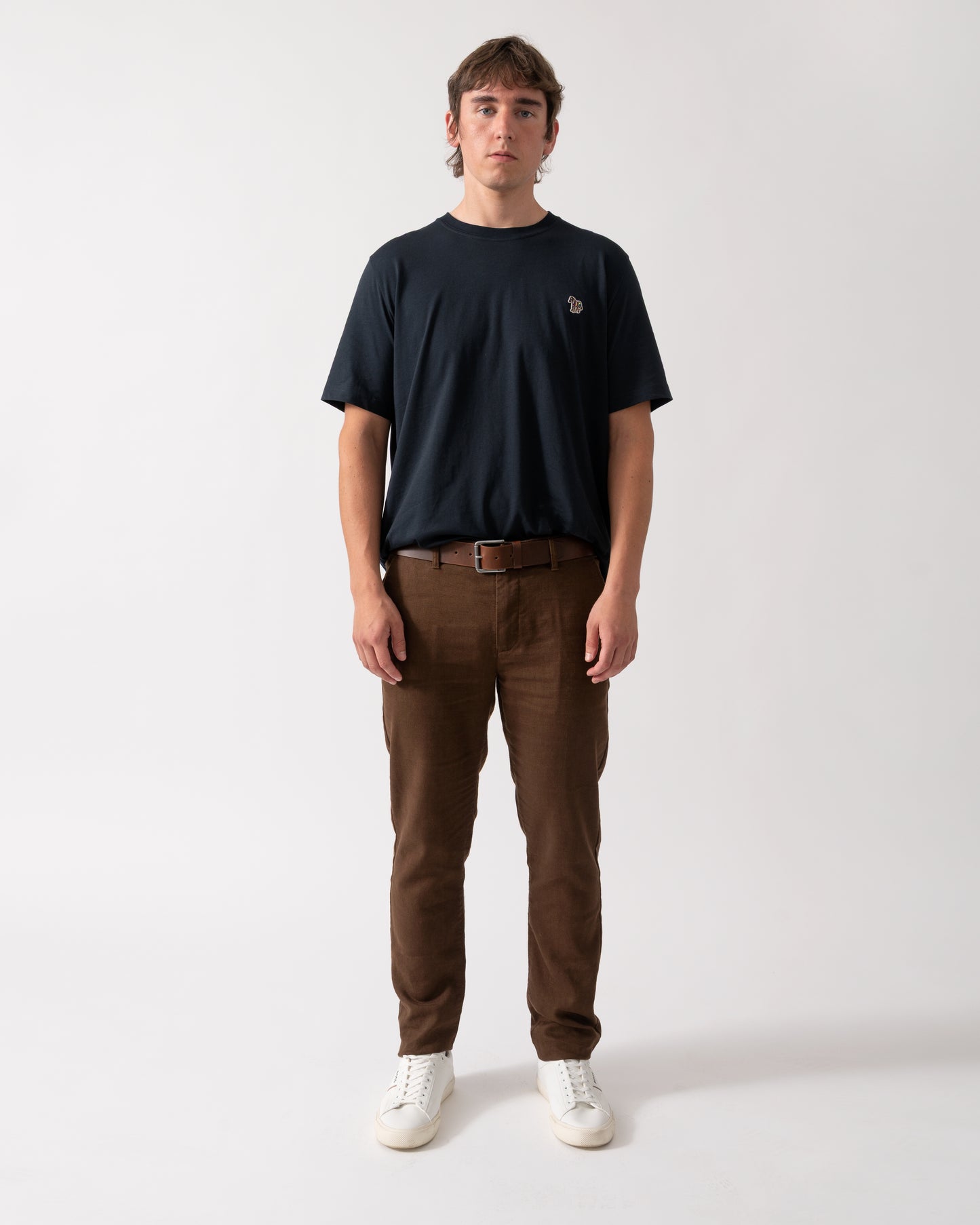full length shot of a model wearing a PS Paul Smith Mens Regular Fit Zebra Logo T-Shirt M2R-011R-WZEBRA in 49 Very Dark Navy