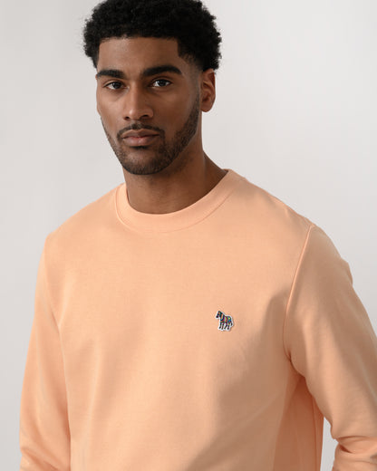 close up shot of a model wearing a PS Paul Smith Mens Regular Fit Zebra Sweatshirt in 15D Orange