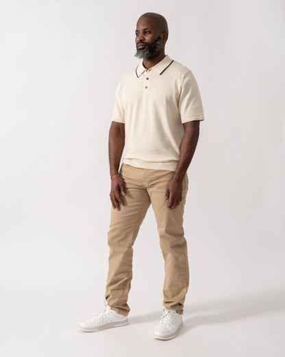 full length shot of a model wearing a PS Paul Smith Mens Short Sleeve Knit Polo in White