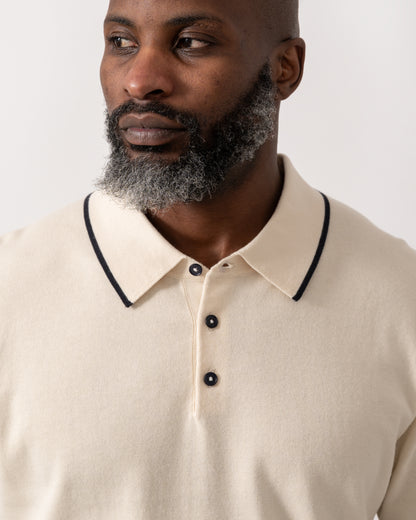 detial shot of a model wearing a PS Paul Smith Mens Short Sleeve Knit Polo in White