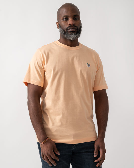 Model wearing a PS Paul Smith Mens Short Sleeve Zebra Graphic T-Shirt in Orange