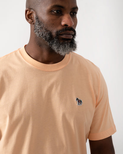 Detail shot of a Model wearing a PS Paul Smith Mens Short Sleeve Zebra Graphic T-Shirt in Orange