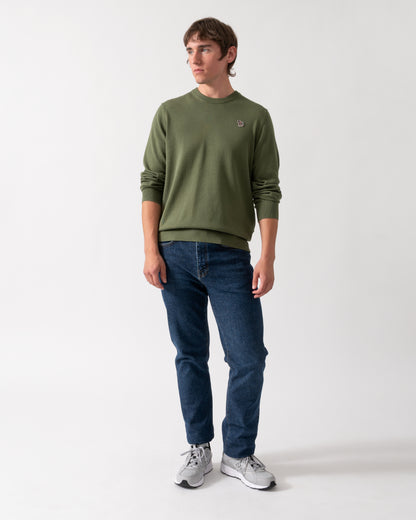 full length shot of a model wearing a PS Paul Smith Mens Zebra Badge Crew Neck Sweater in 35C Green
