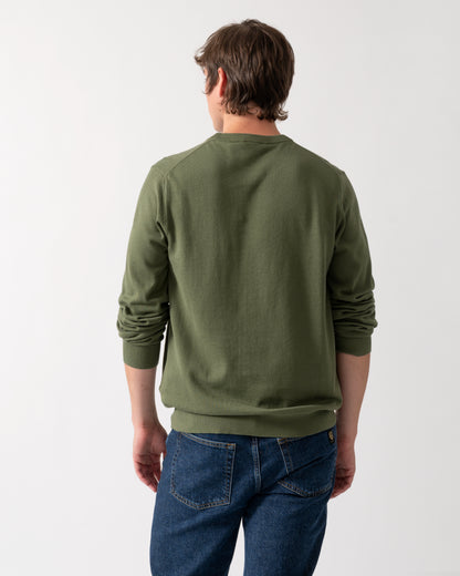 back shot of a model wearing a PS Paul Smith Mens Zebra Badge Crew Neck Sweater in 35C Green