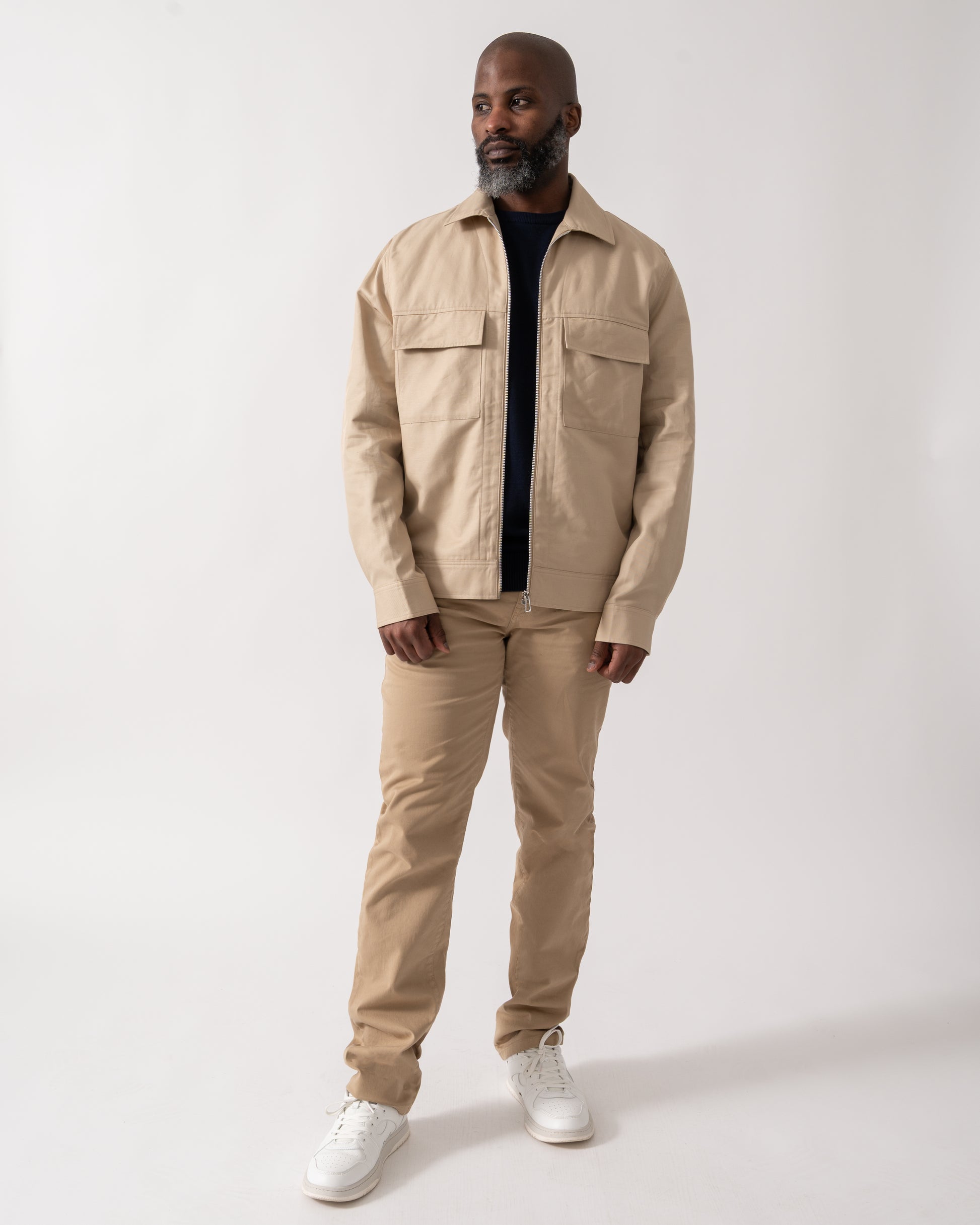 full length shot of a model wearing a PS Paul Smith Mens Zip Overshirt in Ecru