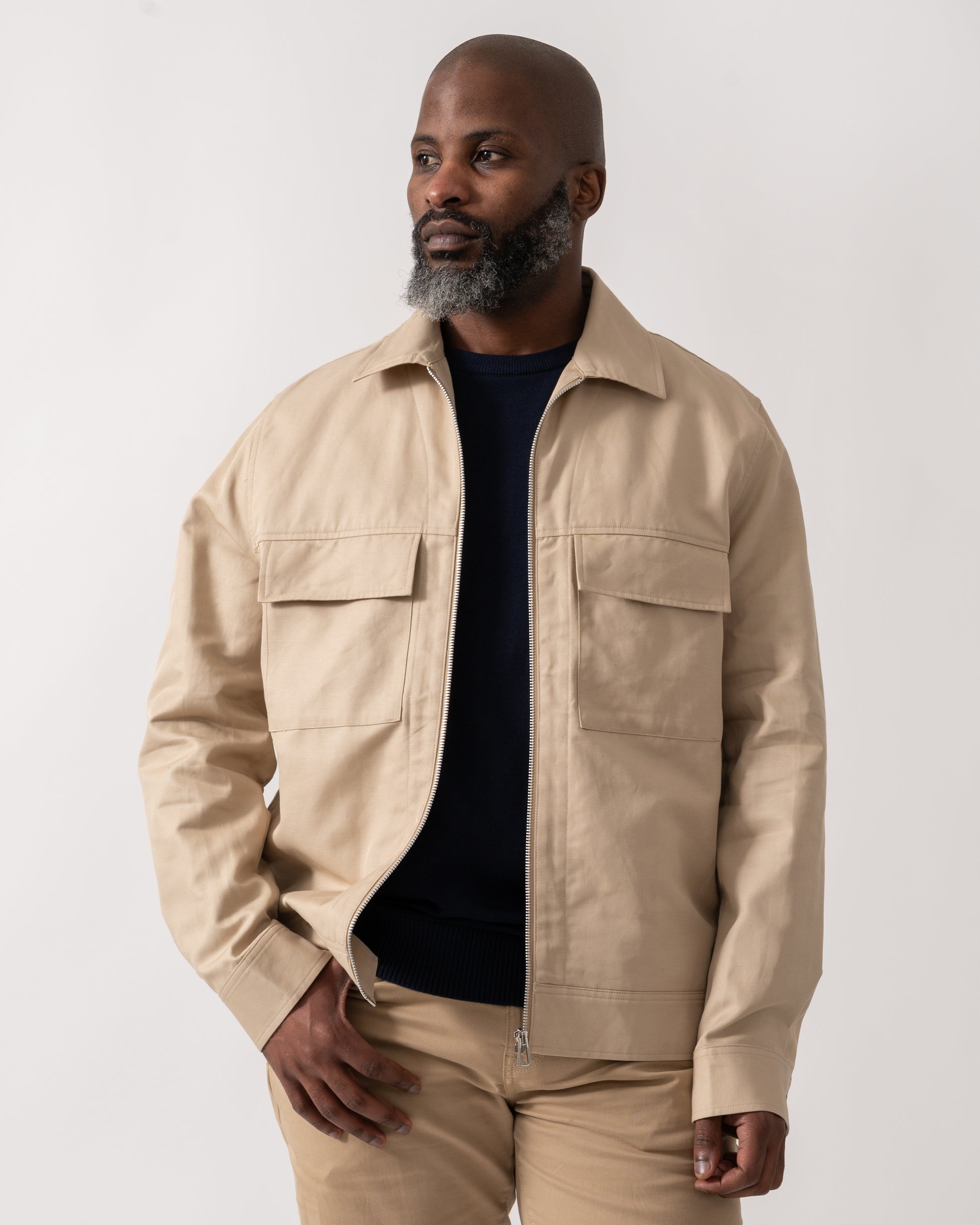 model wearing a PS Paul Smith Mens Zip Overshirt in Ecru