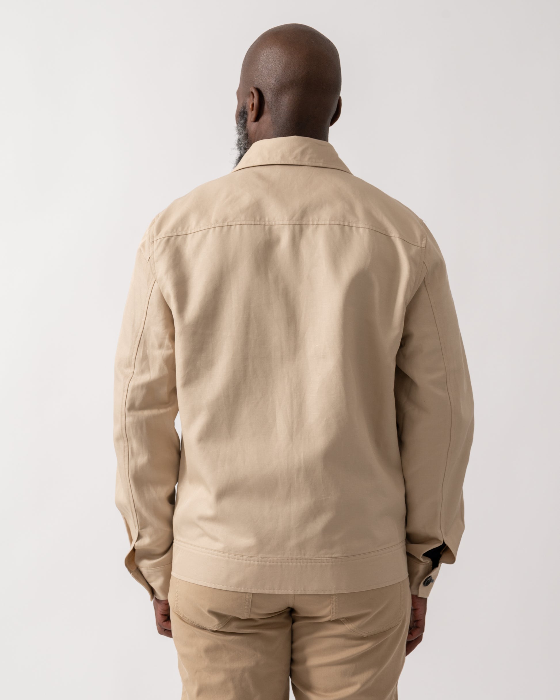 back shot of a model wearing a PS Paul Smith Mens Zip Overshirt in Ecru