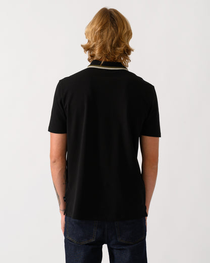 studio photograph of the back of a model wearing a PS Paul Smith Mens Zip Polo Shirt with Tipped Collar and Placket in 79 Black