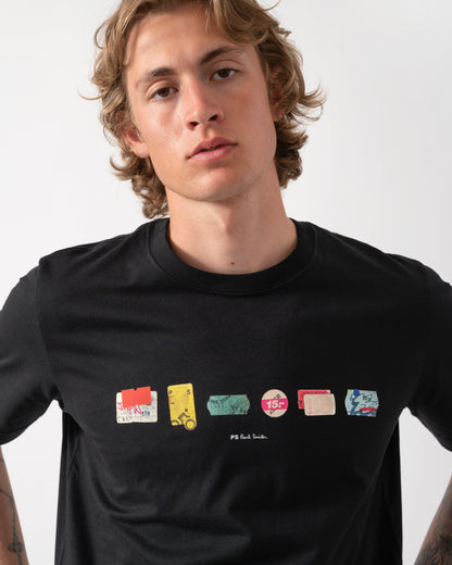 close up of model wearing a PS Paul Smith Mens "In A Row" Graphic T-Shirt in 79 Black 