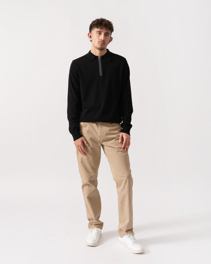 Model wearing a PS Paul Smith Mens Long Sleeve Knit Polo in 79 Black - Full length