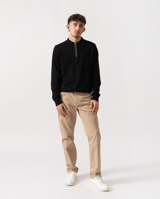 Model wearing a PS Paul Smith Mens Long Sleeve Knit Polo in 79 Black - Full length