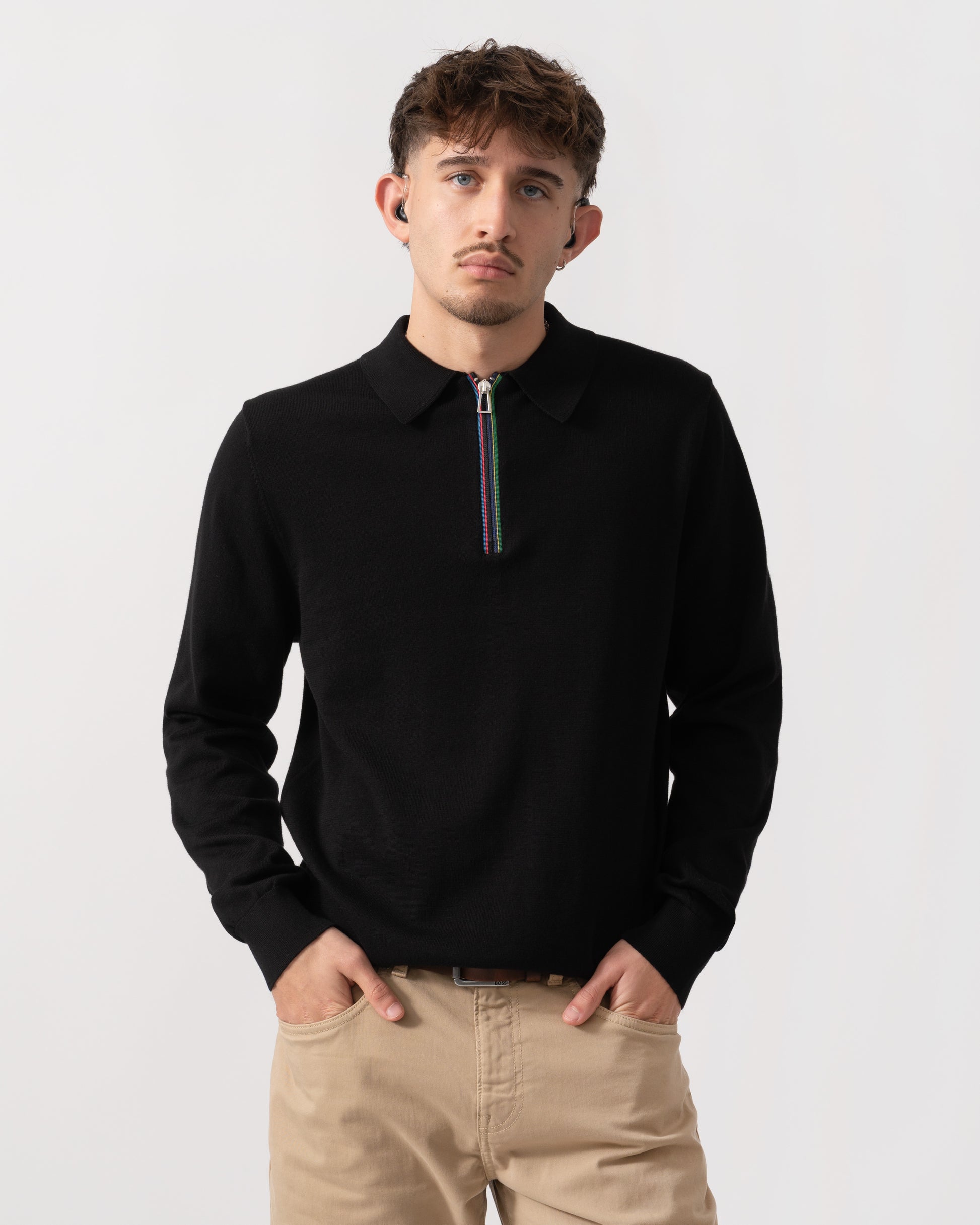 Model wearing a PS Paul Smith Mens Long Sleeve Knit Polo in 79 Black - Front