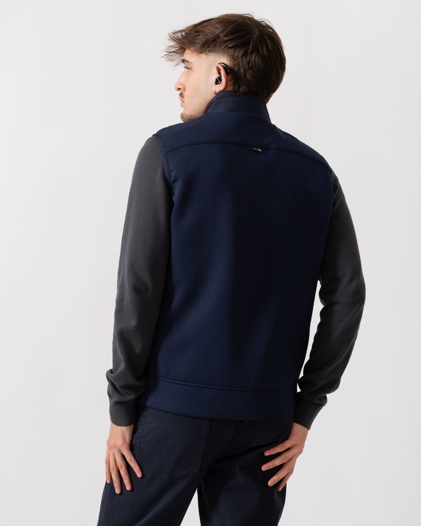 Model wearing PS Paul Smith Mens Mixed Media Gilet in 49 Very Dark Navy - back