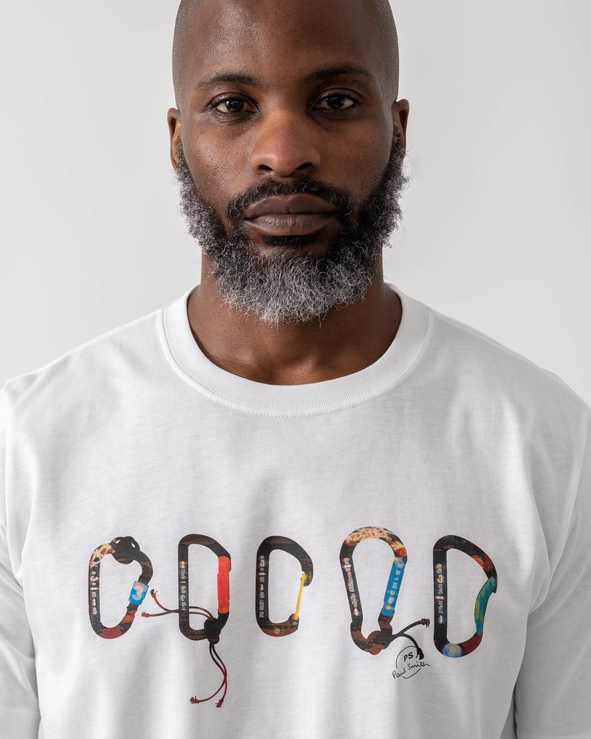 Model wearing PS Paul Smith Mens Regular Fit Carabiner T-Shirt in 01 White - Detail