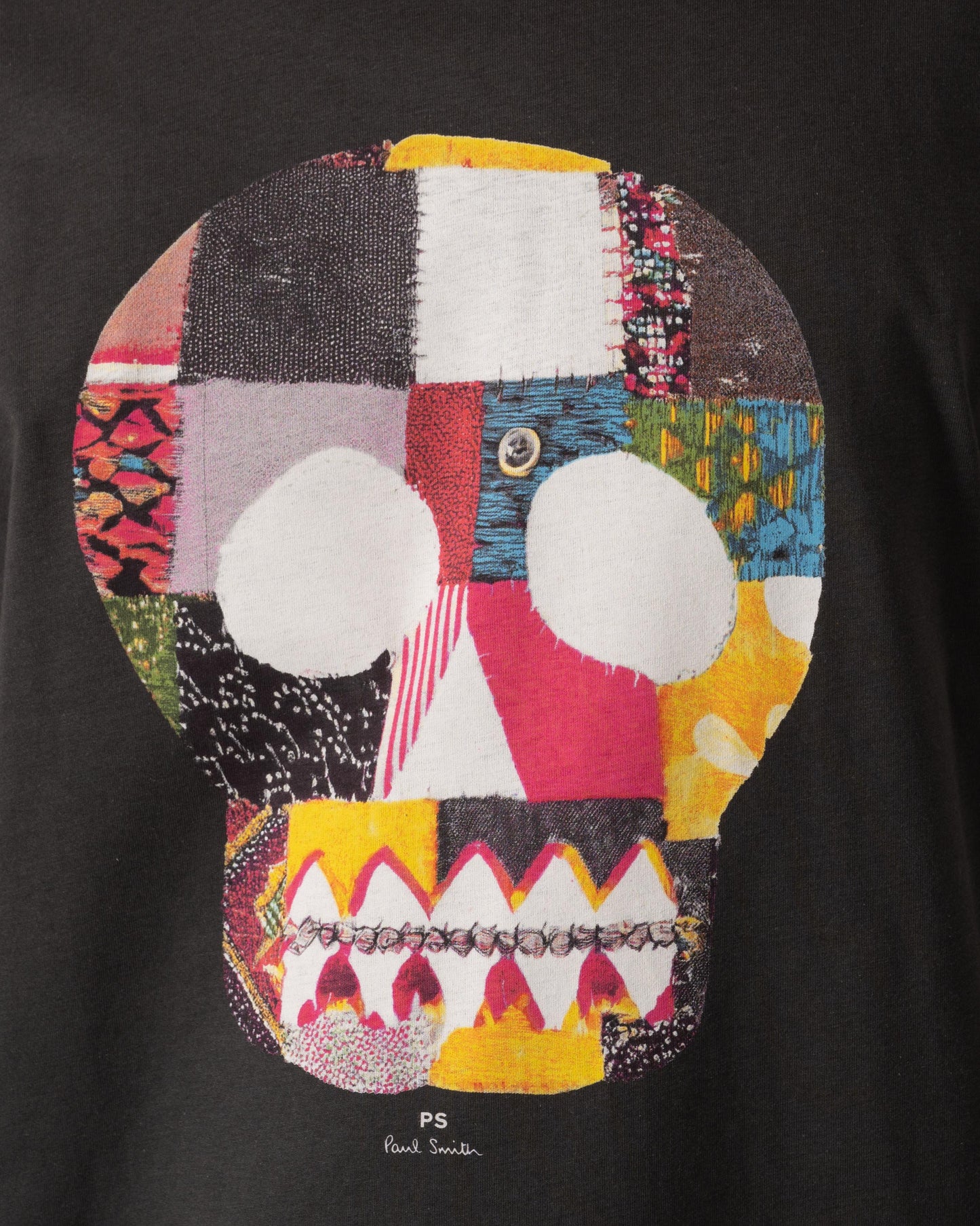 Model wearing PS Paul Smith Mens Regular Fit Fabric Skull T-Shirt in 76 Grey - Graphic detail