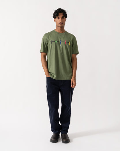 Man wearing PS Paul Smith Mens Regular Fit Table Football Graphic T-Shirt - 35D Military Green