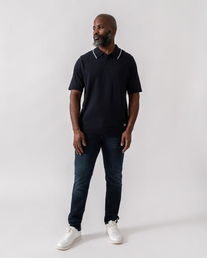 Model wearing PS Paul Smith Mens Short Sleeve Knit Polo in 49 Blue - Full Length