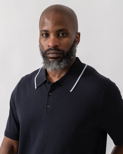 Model wearing PS Paul Smith Mens Short Sleeve Knit Polo in 49 Blue - Detail