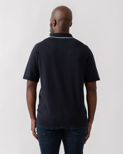 Model wearing PS Paul Smith Mens Short Sleeve Knit Polo in 49 Blue - back