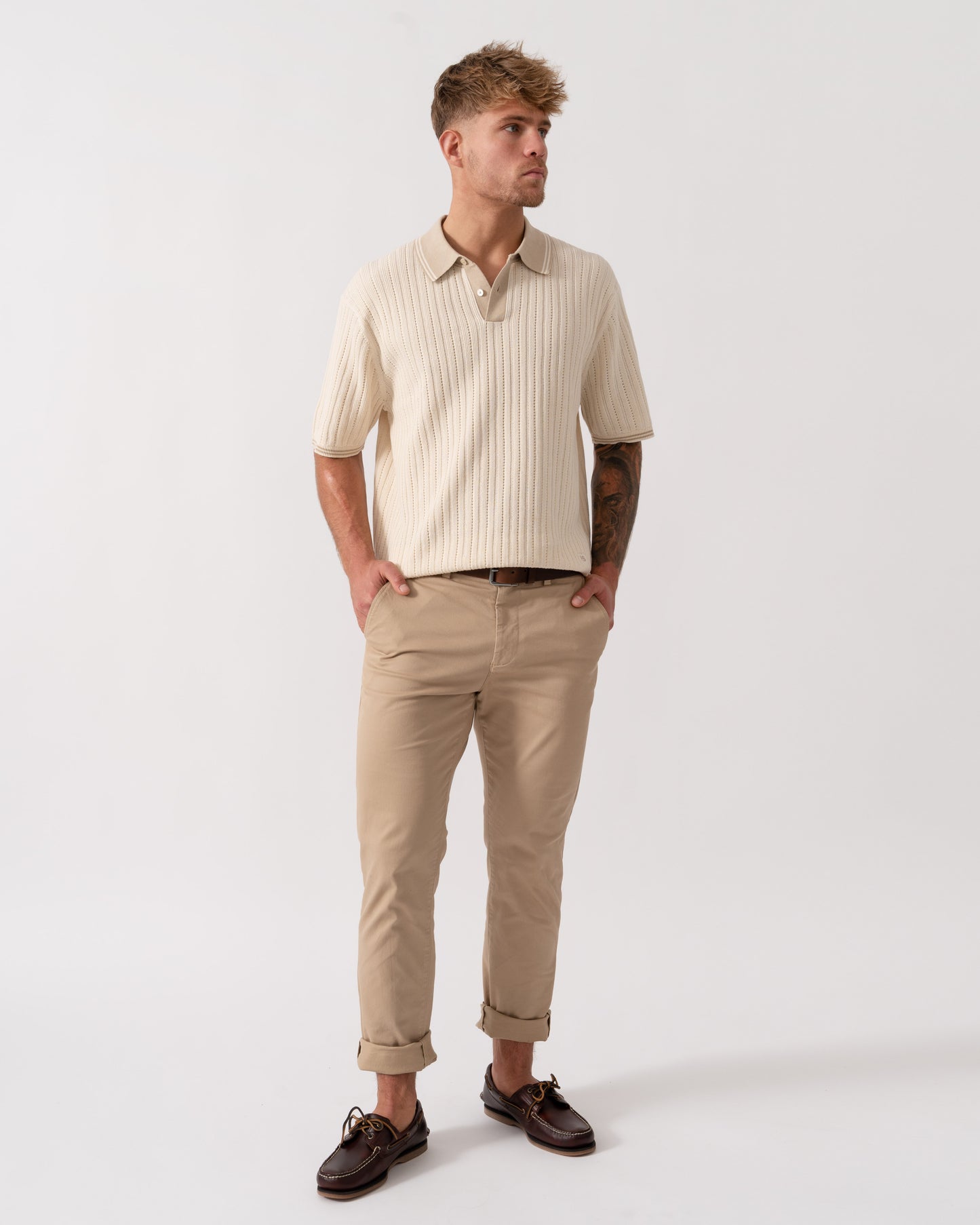 Model wearing PS Paul Smith Mens Rib Knitted Polo in 04 White - Full Length