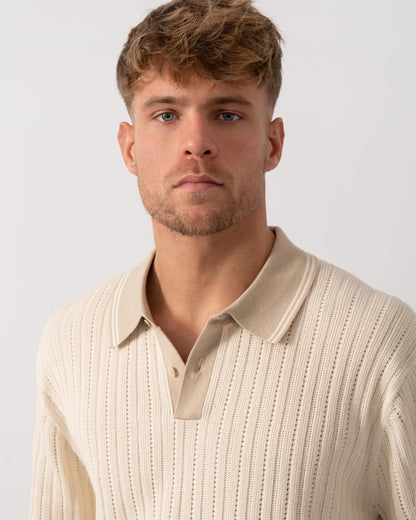 Model wearing PS Paul Smith Mens Rib Knitted Polo in 04 White - Detail