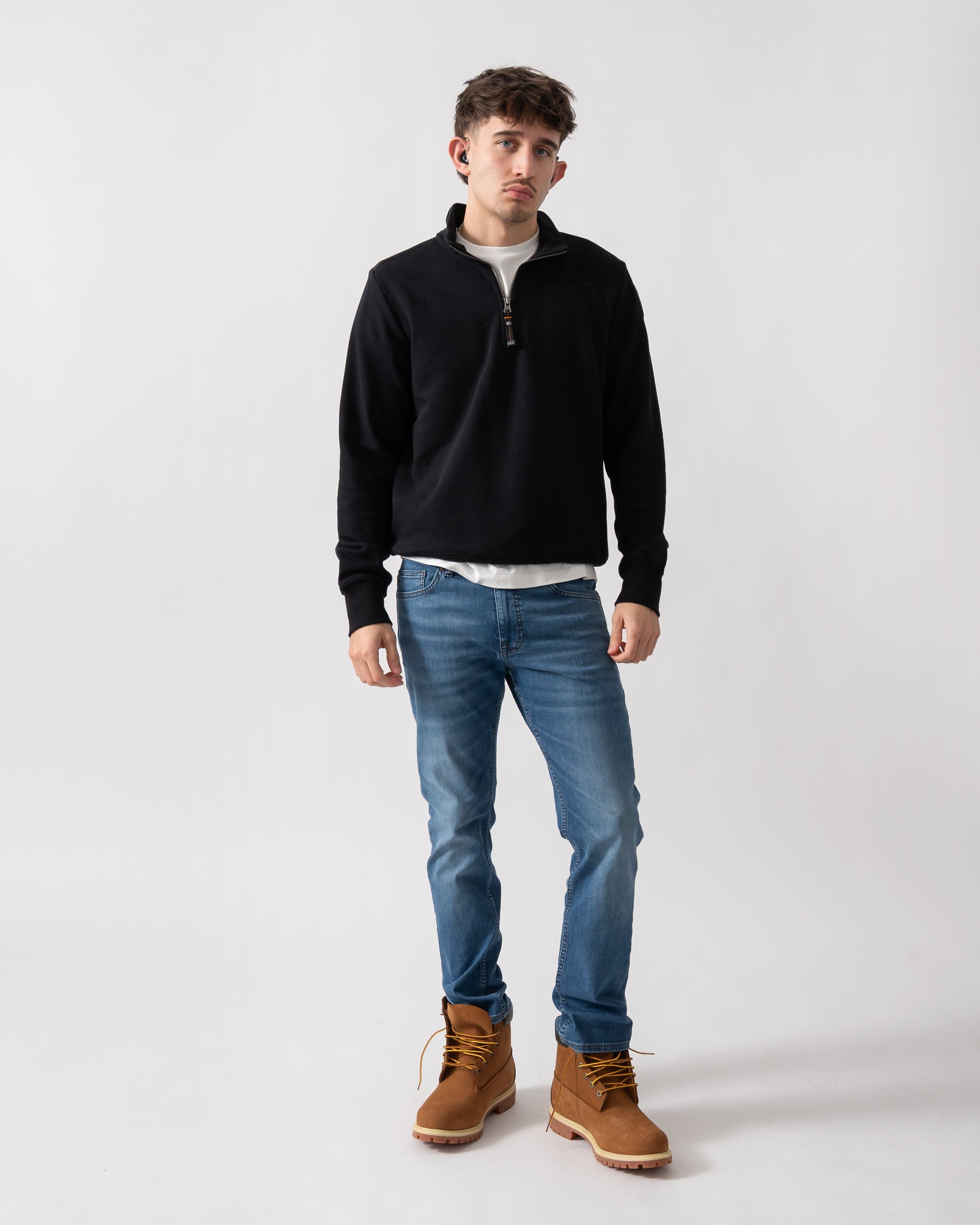 full length shot of a model wearing a Parajumpers Broad Peak Mens quarter Zip Sweatshirt in Black 541