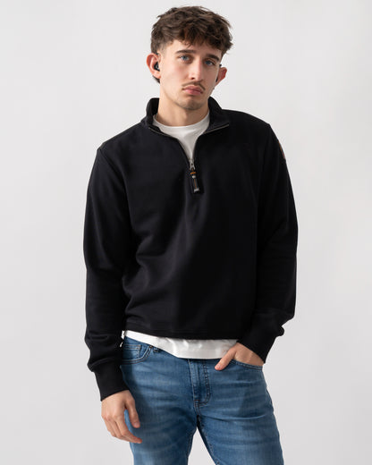 studio shot of a model wearing a Parajumpers Broad Peak Mens quarter Zip Sweatshirt in Black 541