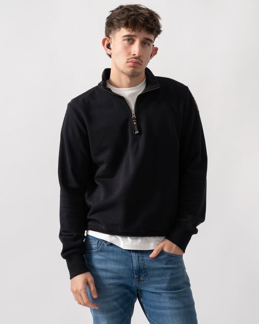 studio shot of a model wearing a Parajumpers Broad Peak Mens quarter Zip Sweatshirt in Black 541