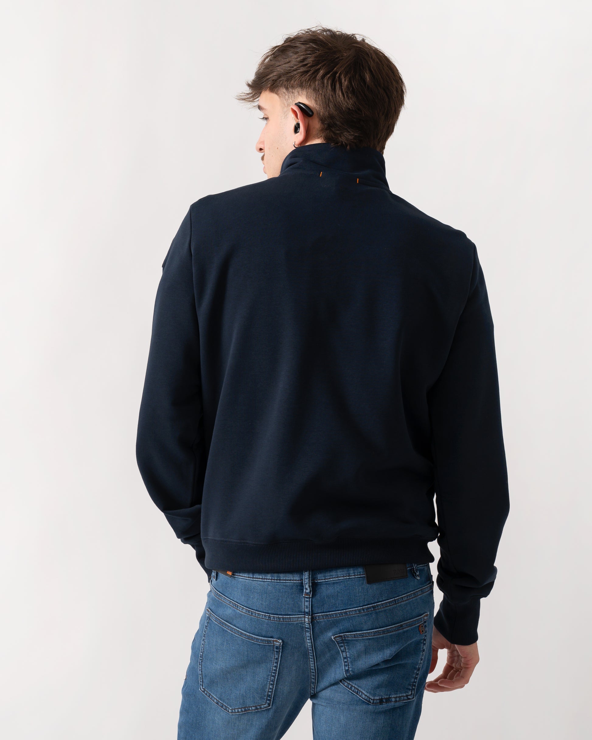 back shot of a model wearing a Parajumpers Broad Peak Mens quarter Zip Sweatshirt in Blue Navy 316