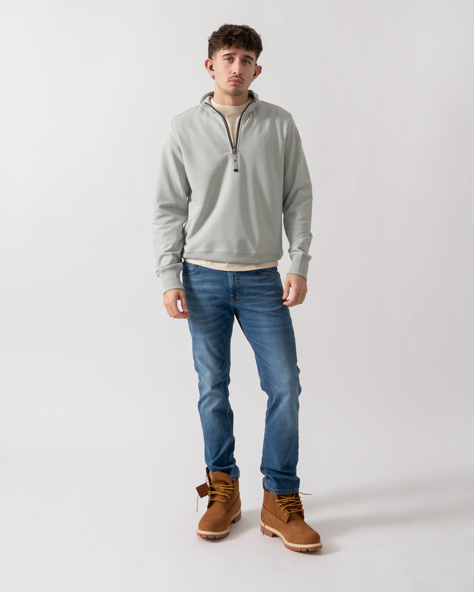 full length shot of a model wearing a Parajumpers Broad Peak Mens 1/4 Zip Sweatshirt in Fresh Grey 271