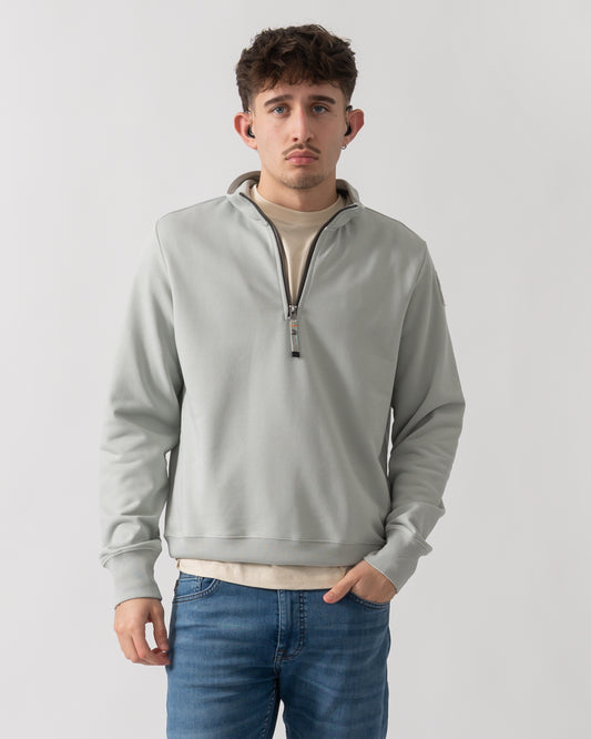 Studio shot of a model wearing a Parajumpers Broad Peak Mens 1/4 Zip Sweatshirt in Fresh Grey 271