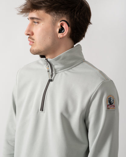 close up shot of a model wearing a Parajumpers Broad Peak Mens 1/4 Zip Sweatshirt in Fresh Grey 271