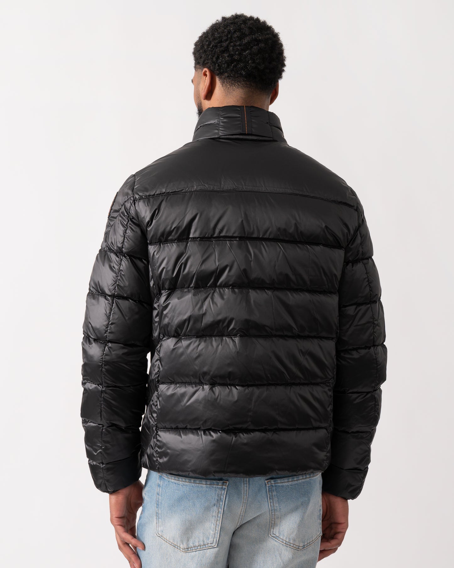 back of a model wearing a Parajumpers Dillon Mens Down Jacket in Black