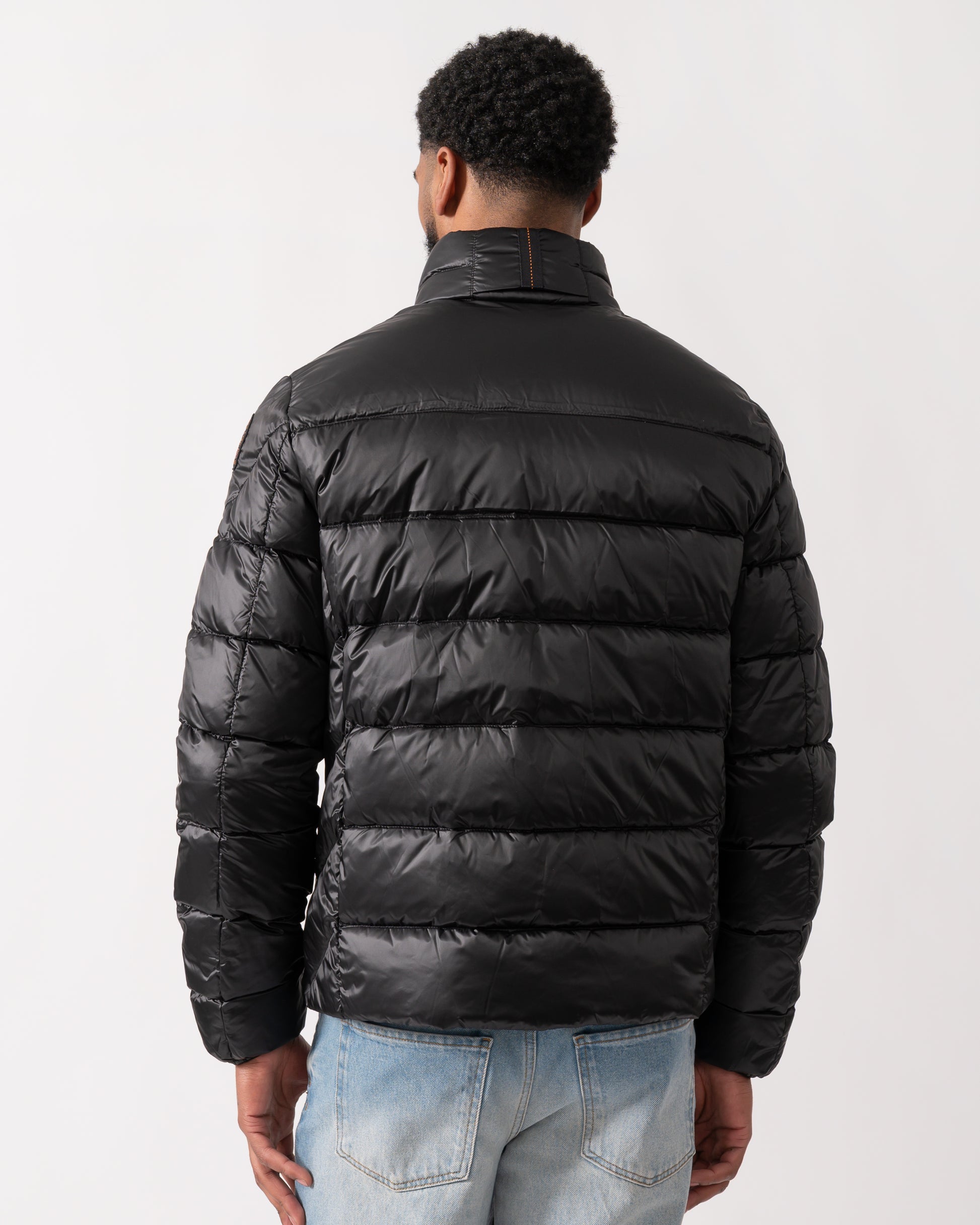 back of a model wearing a Parajumpers Dillon Mens Down Jacket in Black