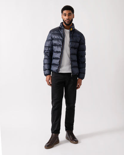 Wide shot of a model wearing a Parajumpers Dillon Mens Down Jacket in Blue Navy