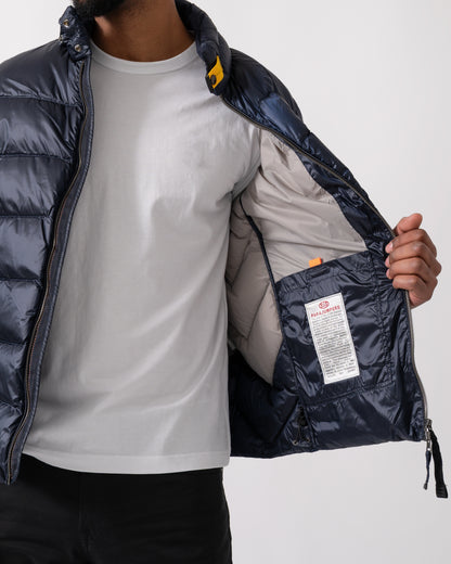 Closeup of a model wearing a Parajumpers Dillon Mens Down Jacket in Blue Navy
