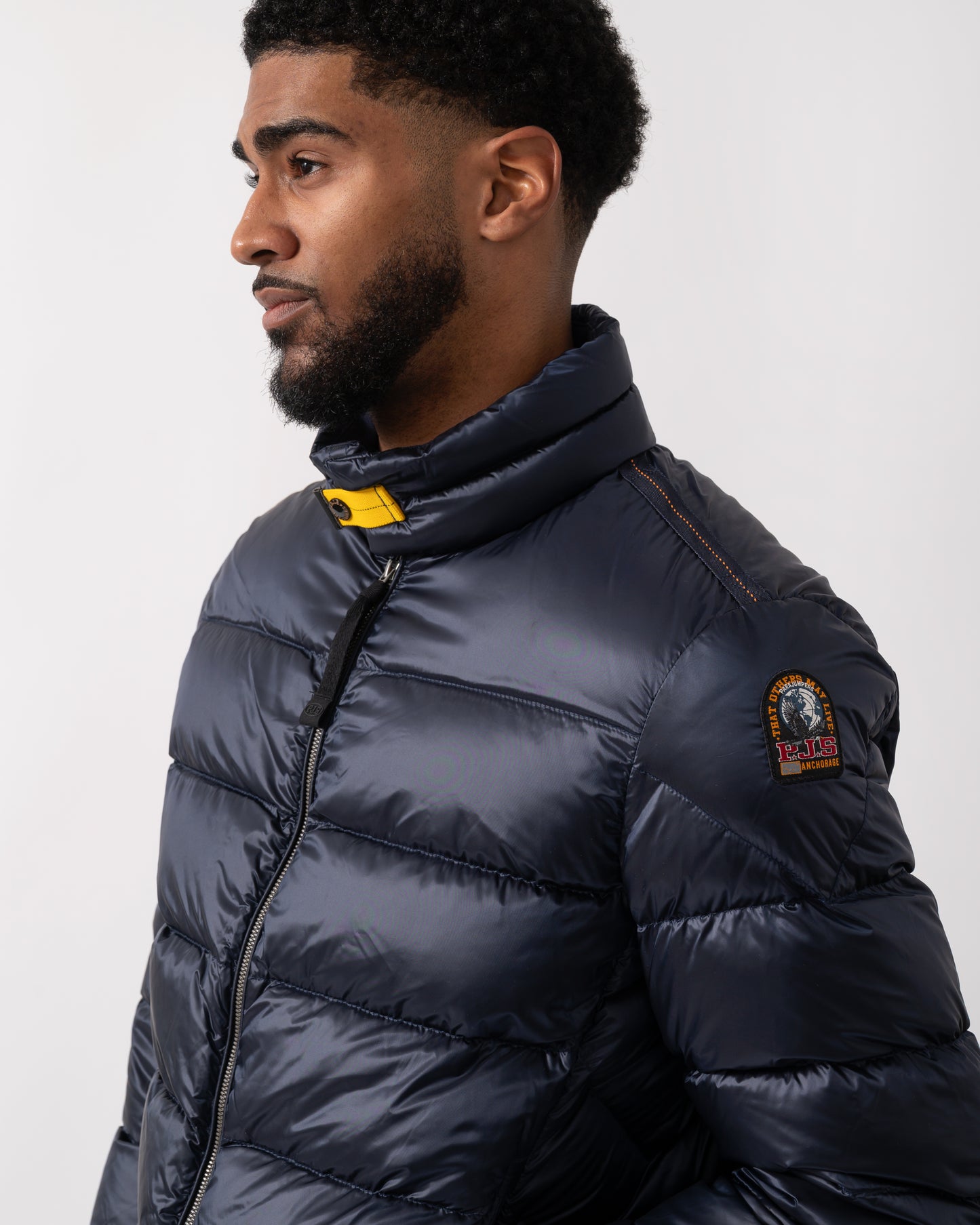 Shoulder detail of a Parajumpers Dillon Mens Down Jacket in Blue Navy