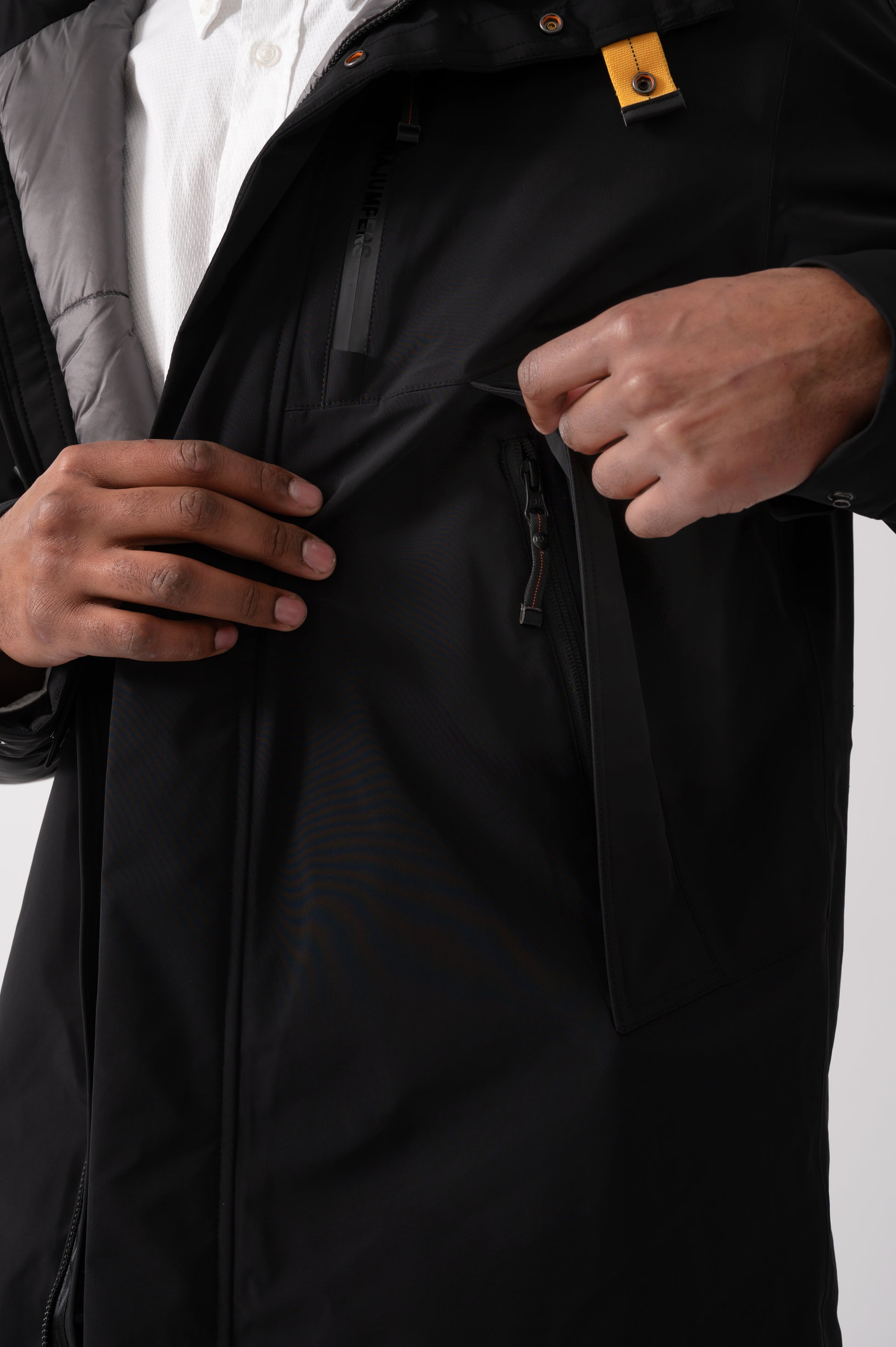 close up of a model wearing a Parajumpers Easy Mens Hooded Padded Coat in Black