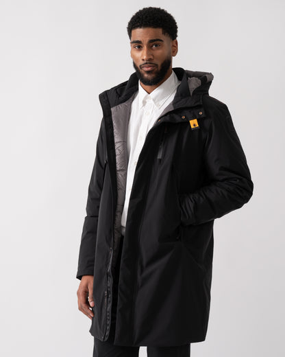 model wearing a Parajumpers Easy Mens Hooded Padded Coat in Black