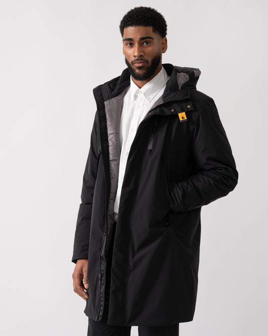 model wearing a Parajumpers Easy Mens Hooded Padded Coat in Black