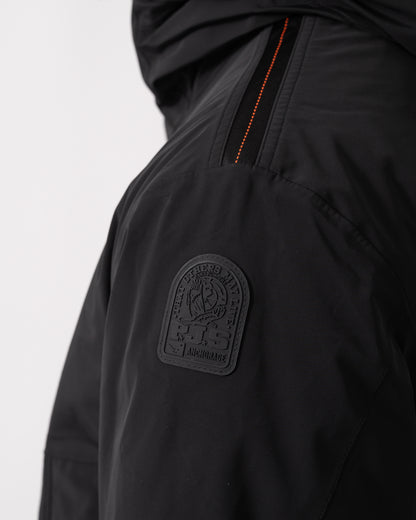 logo detail of a Parajumpers Easy Mens Hooded Padded Coat in Black