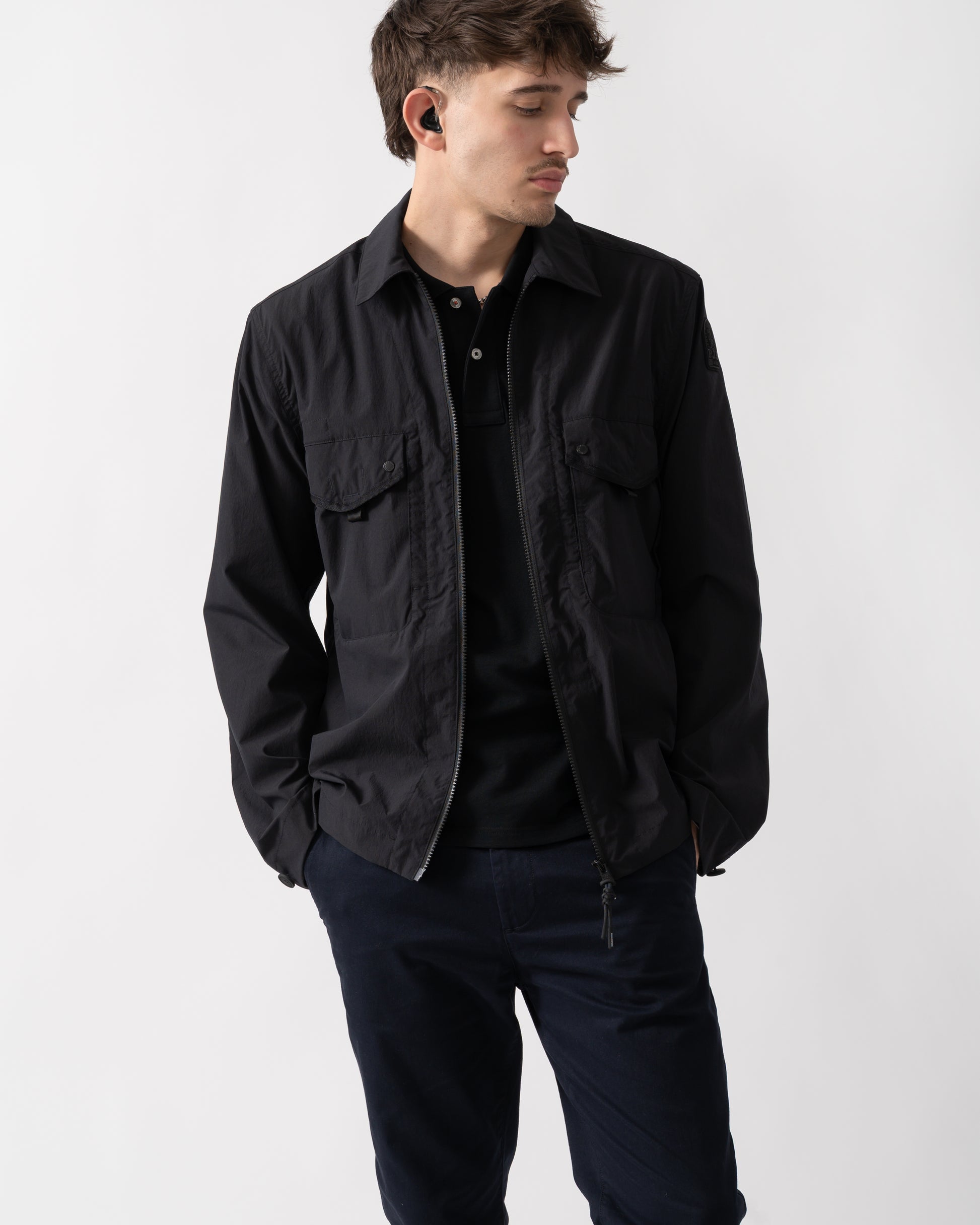 mid shot of a model wearing a Parajumpers Elgin Mens Overshirt in Black 541