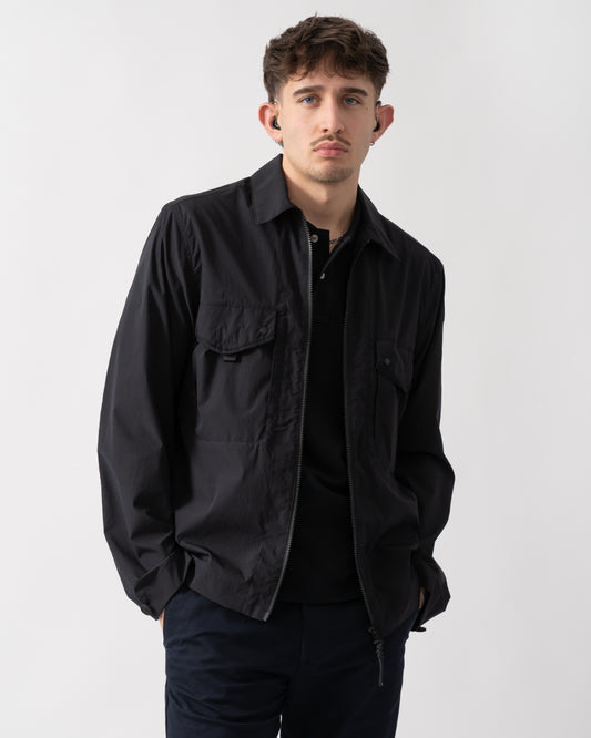 studio shot of a model wearing a Parajumpers Elgin Mens Overshirt in Black 541