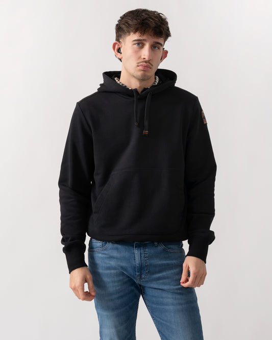 studio shot of a model wearing a Parajumpers Everest Mens Pullover Hoodie in Black 541