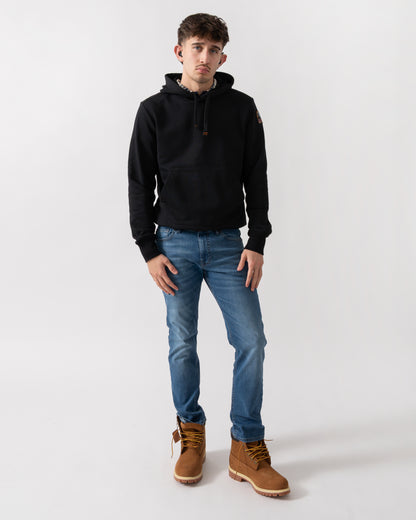 full length shot of a model wearing a Parajumpers Everest Mens Pullover Hoodie in Black 541