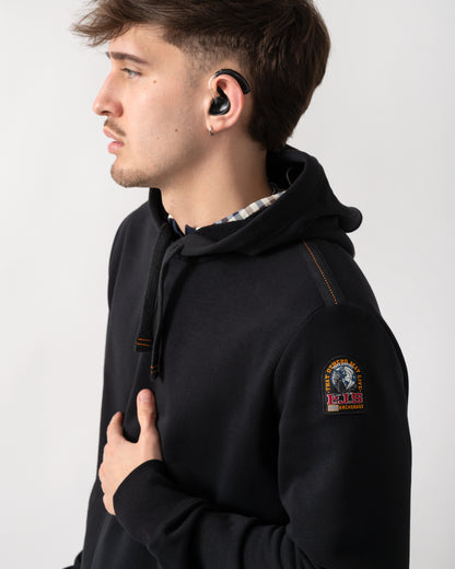 close up shot of a model wearing a Parajumpers Everest Mens Pullover Hoodie in Black 541