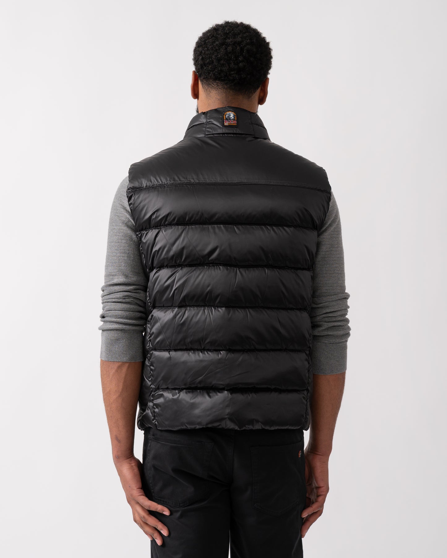 back shot of a model wearing a Parajumpers Jeordie Mens Down Vest in Black