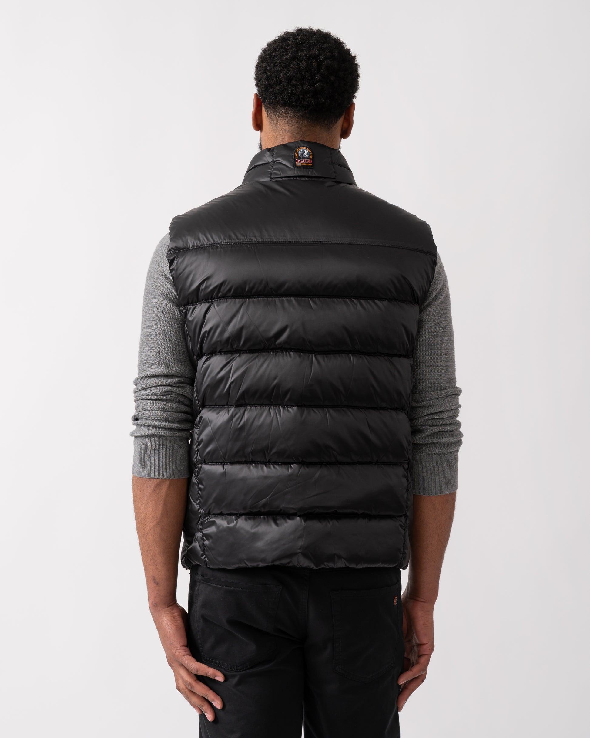 back shot of a model wearing a Parajumpers Jeordie Mens Down Vest in Black